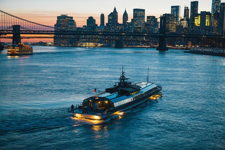Savor a delicious 3-course dinner while cruising past iconic NYC landmarks including the Statue of Liberty and Brooklyn Bridge all under the stars with live music and drinks.